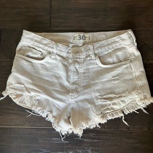 Free people we the free tan denim shorts